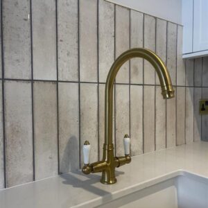 Phoenician Monobloc Mixer with Porcelain Levers in Aged Brass - Perrin & Row